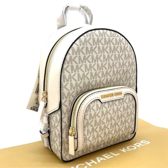 Michael Kors Jaycee Extra Small Convertible Zip Packet Backpack Cream/White - Picture 1 of 10
